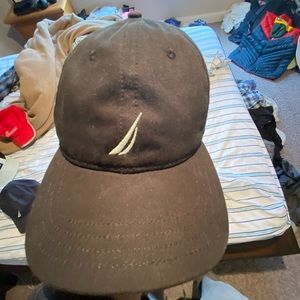 Black Nautica hat w/ custom gold kangaroo pin.